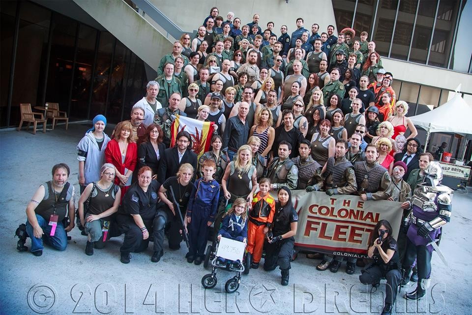 Shot by Troy Nelson, Dragon Con 2014, gathering of the Colonial Fleet. If you look in the center of the mob, you can see Michael Hogan, Kate Vernon, and Richard.