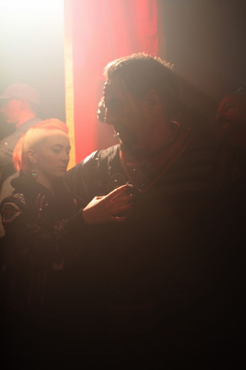 Wardrobe specialist Claire Max checking the fit on Richard's sleeve